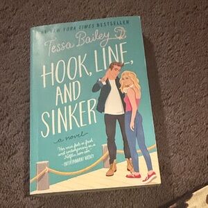 Avon paperback book with teal and yellow spine